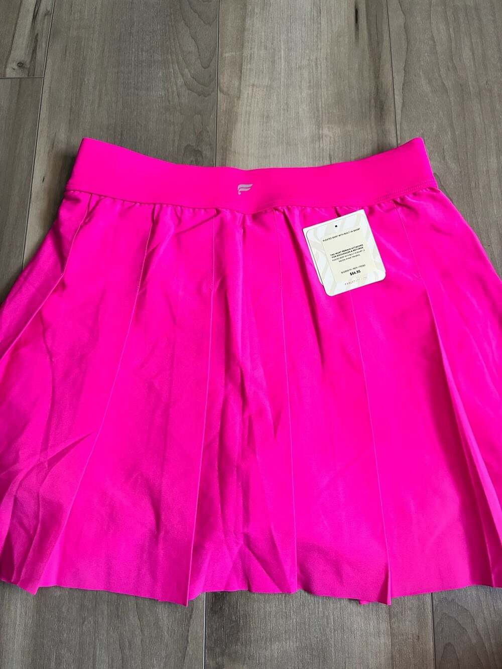 Fabletics Pleated Skirt with Built-In Short in Neon Pink Tropic